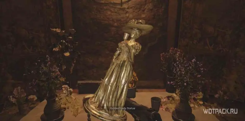 Resident Evil Village статуя золотой леди