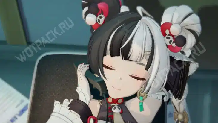 Диалинь откинулась на спинку стула и разговаривает по телефону