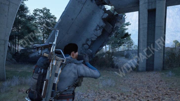 Рейдер фотографирует разрушенный мост